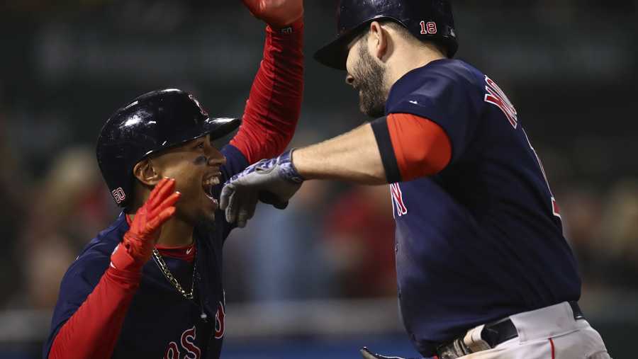 Grand slam leads Red Sox to 8th straight win