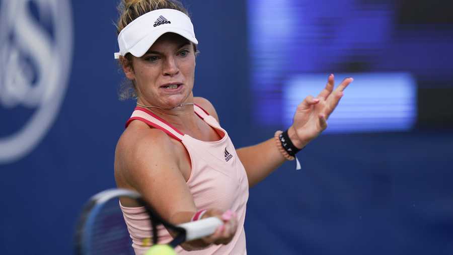 Caty McNally, of the United States, returns to Alize Cornet, France, at the Western & Southern Open tennis tournament, Saturday, Aug. 22, 2020, in New York. (AP Photo/Frank Franklin II)