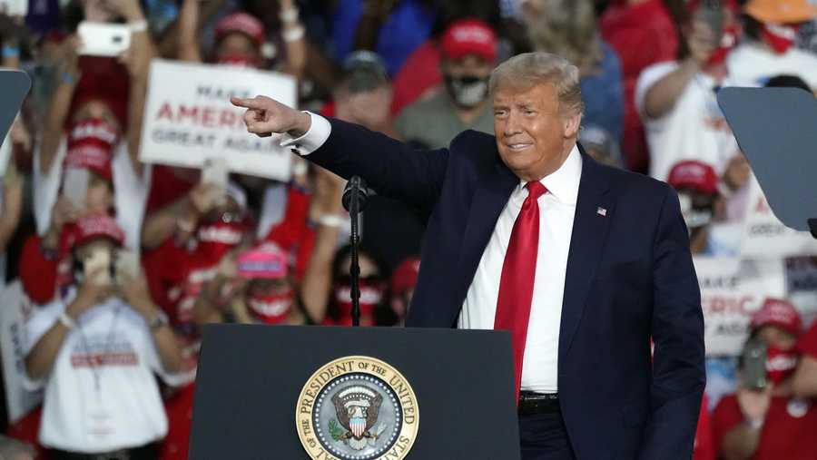 President Donald Trump arrives at a campaign rally at the Orlando Sanford International Airport Monday, Oct. 12, 2020, in Sanford, Fla. (AP Photo/John Raoux)