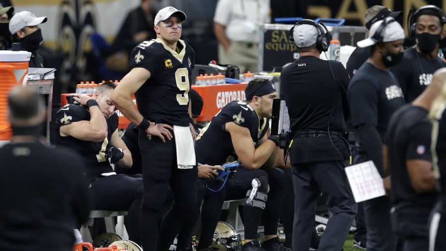 New Orleans Saints quarterback Drew Brees (9) watches from the sideline in the second half of an NFL football game against the San Francisco 49ers in New Orleans, Sunday, Nov. 15, 2020. (AP Photo/Butch Dill)