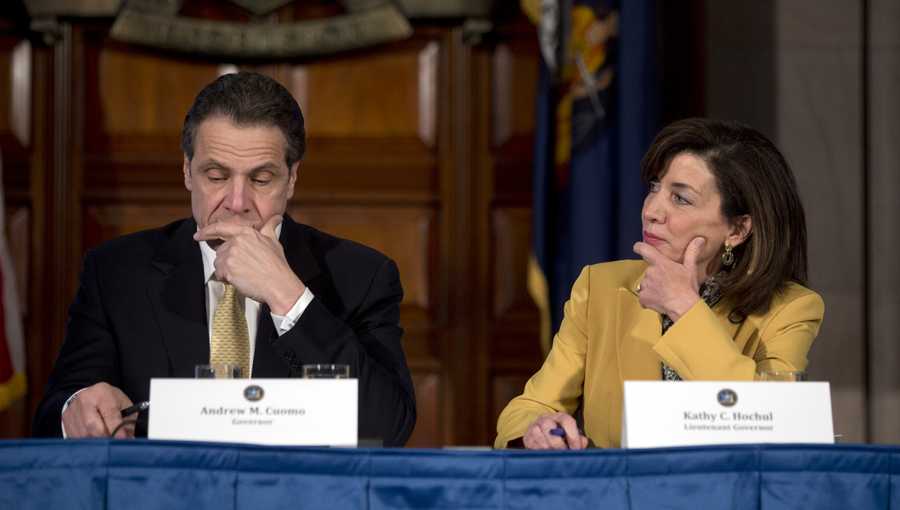 New York Gov. Andrew Cuomo, left, and Lt. Gov. Kathy Hochul listen to a speaker during a cabinet meeting in the Red Room at the Capitol on Wednesday, Feb. 25, 2015, in Albany, N.Y.