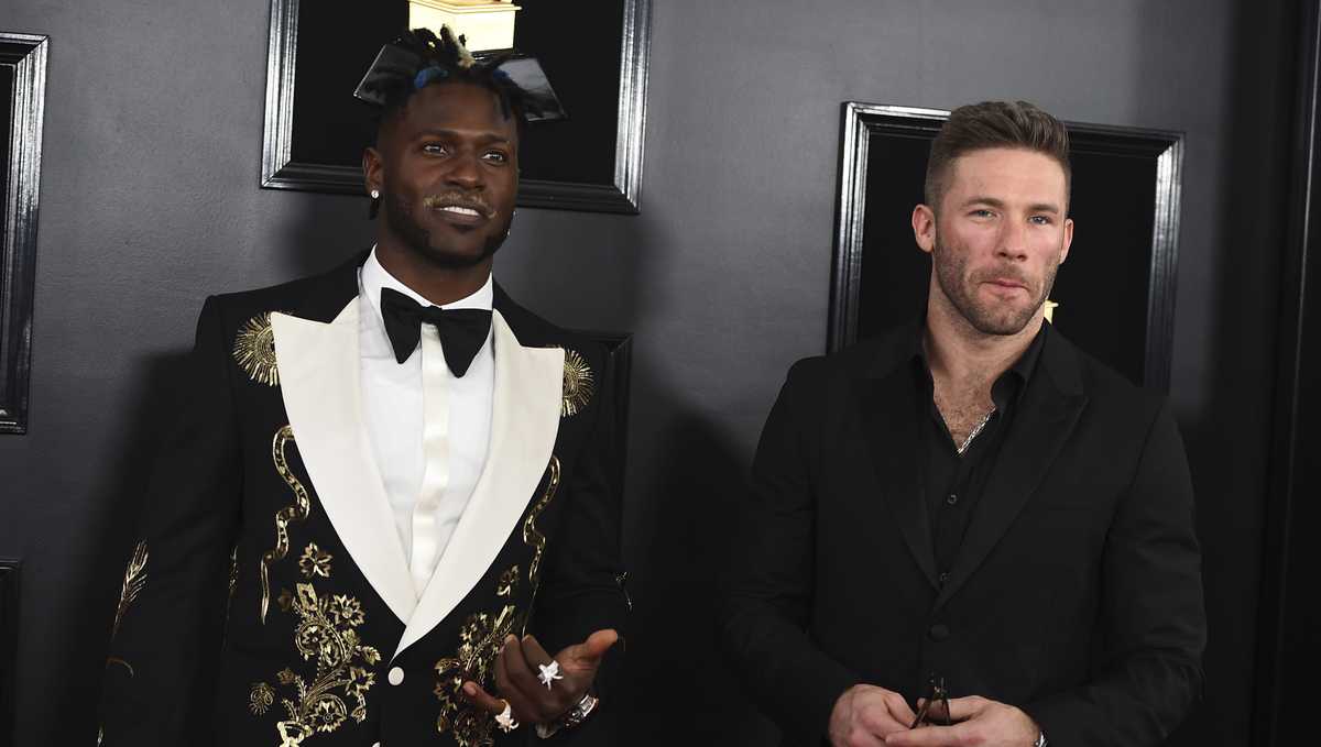 Oakland Raiders wide receiver Antonio Brown holds his jersey during an NFL  football news conference, Wednesday, March 13, 2019, in Alameda, Calif. (AP  Photo/Ben Margot)