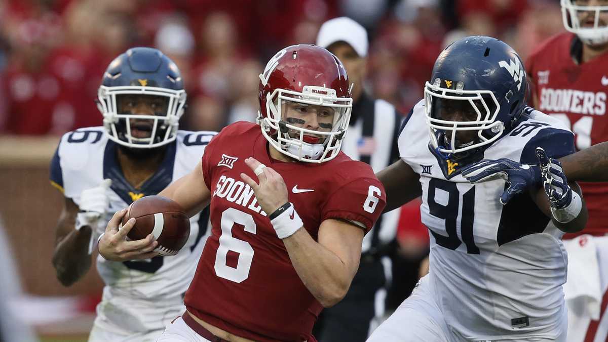 Baker Mayfield recreates iconic Brett Favre Draft Day picture