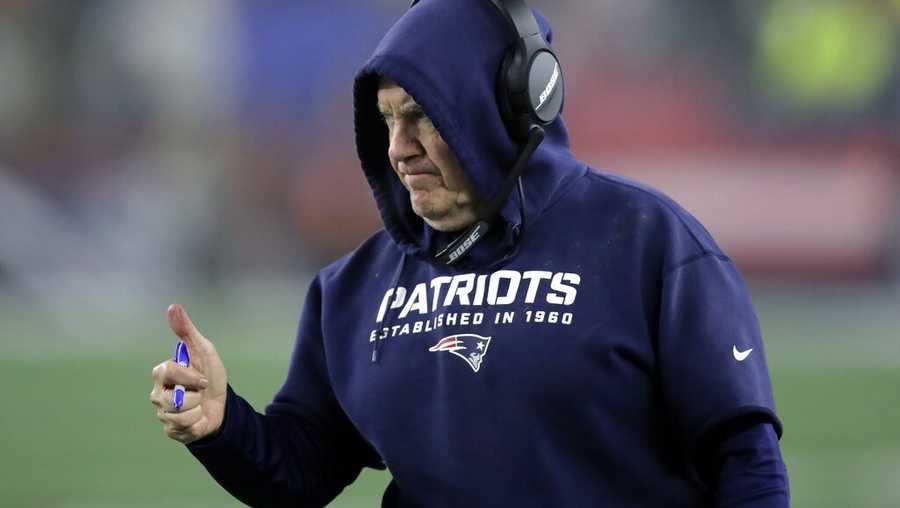 New England Patriots head coach Bill Belichick gives a signal to the team from the sideline in the first half of an NFL wild-card playoff football game against the Tennessee Titans, Saturday, Jan. 4, 2020, in Foxborough, Mass. (AP Photo/Charles Krupa)