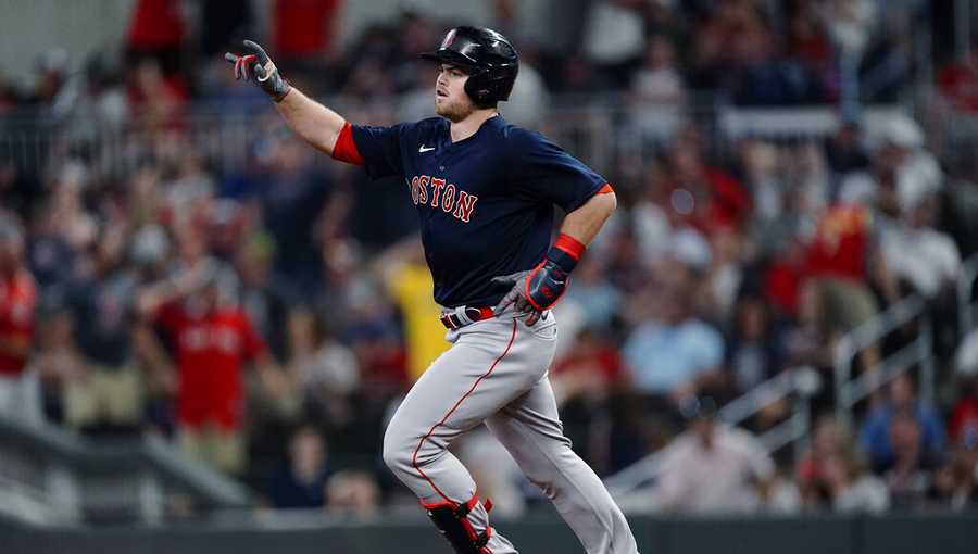 Hunter Renfroe of the Boston Red Sox rounds second base after