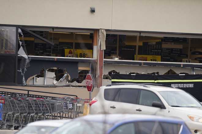 Windows&#x20;appear&#x20;damaged&#x20;at&#x20;a&#x20;King&#x20;Soopers&#x20;grocery&#x20;store&#x20;where&#x20;a&#x20;shooting&#x20;took&#x20;place&#x20;Monday,&#x20;March&#x20;22,&#x20;2021,&#x20;in&#x20;Boulder,&#x20;Colo.