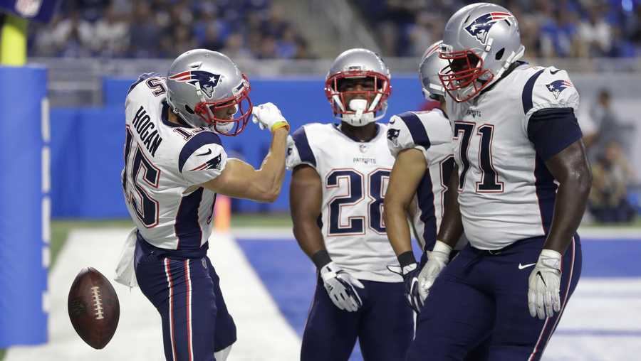 New England Patriots wide receiver Chris Hogan (15) throws down the ball after scoring on a 32-yard pass reception for a touchdown during the first half of an NFL football game, Friday, Aug. 25, 2017, in Detroit.