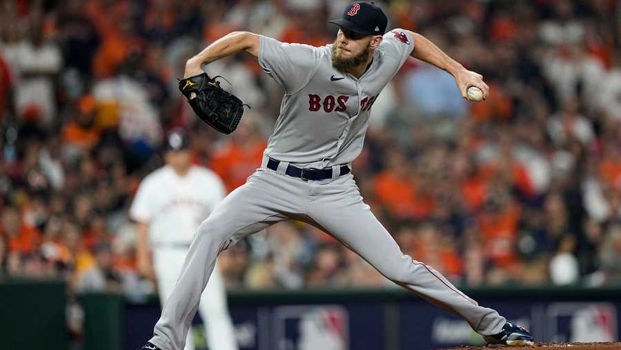 boston red sox starting pitcher chris sale throws against the houston astros during the first inning in game 1 of baseball's american league championship series friday, oct. 15, 2021, in houston. (ap photo/david j. phillip)