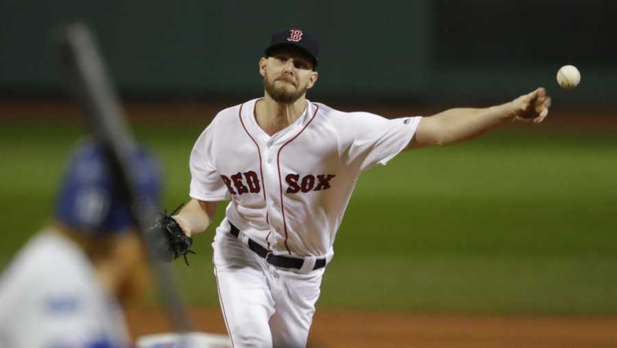Boston Red Sox starting pitcher Chris Sale throws during the first inning of Game 1 of the World Series baseball game against the Los Angeles Dodgers Tuesday, Oct. 23, 2018, in Boston. (AP Photo/Charles Krupa)