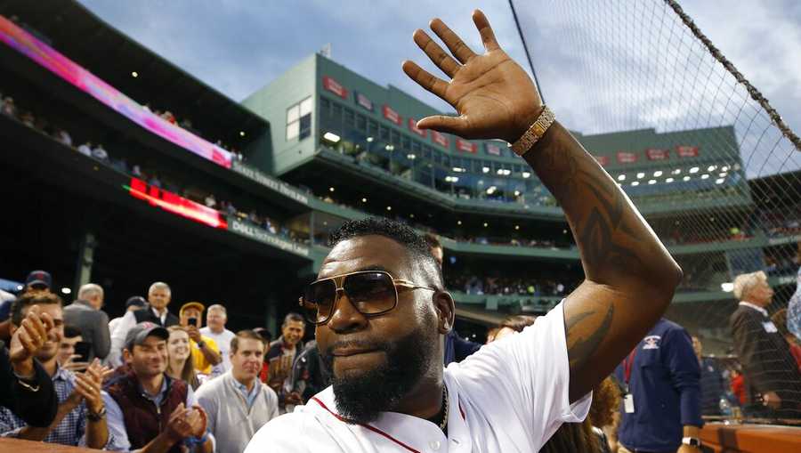 Former Boston Red Sox&apos;s David Ortiz waves to the crowd after throwing out a ceremonial first pitch before a baseball game against the New York Yankees in Boston, Monday, Sept. 9, 2019. (AP Photo/Michael Dwyer)