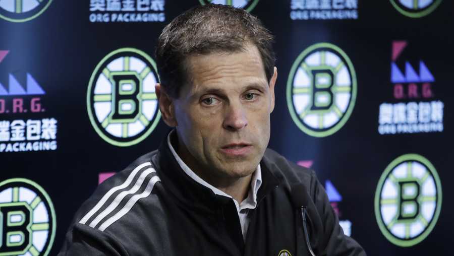Boston Bruins General Manager Don Sweeney speaks during a news conference at the hockey team&apos;s practice facility, Tuesday, Sept. 17, 2019, in Boston. Sweeney announced that the Bruins have signed defenseman Brandon Carlo to a two-year contract with an annual NHL cap hit of $2.85 million. Carlo, 22, skated in 72 games with the Bruins in 2018-19. (AP Photo/Elise Amendola)