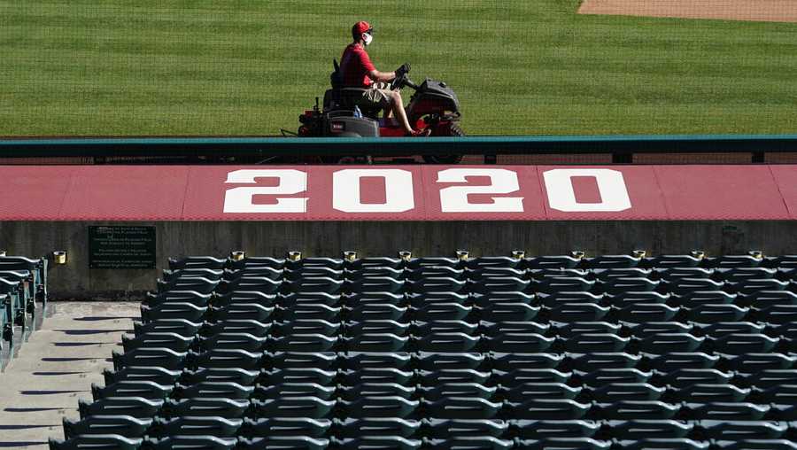 AP PHOTOS: Stadiums deserted as virus postpones opening day