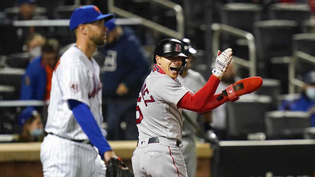 Boston Red Sox's Bobby Dalbec celebrates with Enrique Hernandez