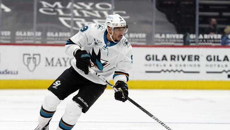 in this march 26, 2021, file photo, san jose sharks left wing evander kane moves the puck during the team's nhl hockey game against the arizona coyotes in glendale, ariz.t he nhl says it will investigate an allegation made by kane’s wife that he bets on his own games and has intentionally tried to lose for gambling profit.