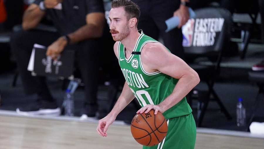 Boston Celtics forward Gordon Hayward (20) handles the ball during the first half of an NBA conference final playoff basketball game against the Miami Heat on Saturday, Sept. 19, 2020, in Lake Buena Vista, Fla. (AP Photo/Mark J. Terrill)