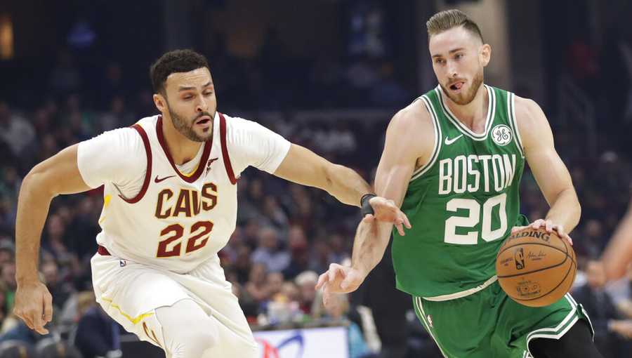 Boston Celtics' Gordon Hayward (20) drives past Cleveland Cavaliers' Larry Nance Jr. (22) in the first half of an NBA basketball game, Tuesday, Nov. 5, 2019, in Cleveland. (AP Photo/Tony Dejak)