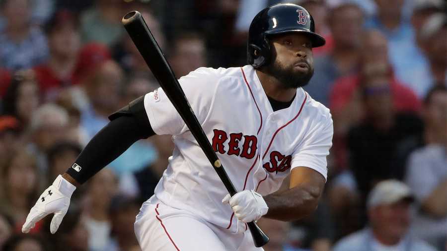 Boston Red Sox's Jackie Bradley Jr. hits a two-run double in the first inning of a baseball game against the New York Yankees at Fenway Park, Thursday, July 25, 2019, in Boston. (AP Photo/Elise Amendola)