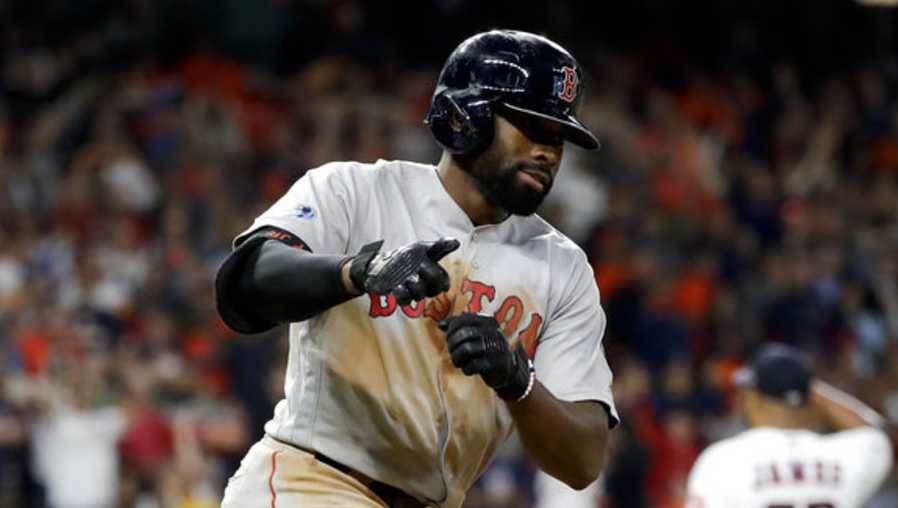 Boston Red Sox's Jackie Bradley Jr., celebrates after his two-run home run off Houston Astros pitcher Josh James during the sixth inning in Game 4 of a baseball American League Championship Series on Wednesday, Oct. 17, 2018, in Houston.(AP Photo/David J. Phillip)