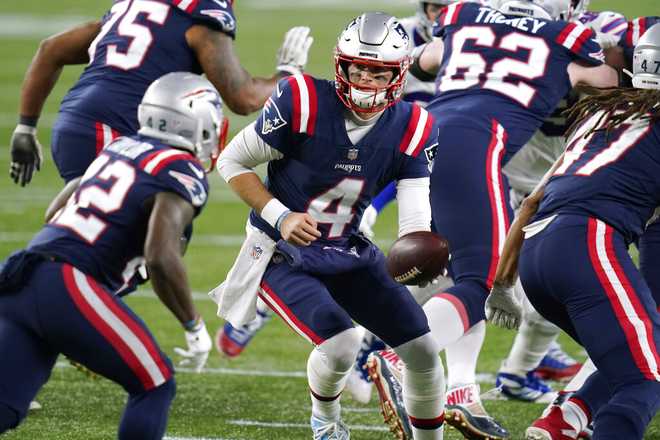 Patriots run to gritty 14-10 win over Bills on Monday Night Football to  take control of AFC East