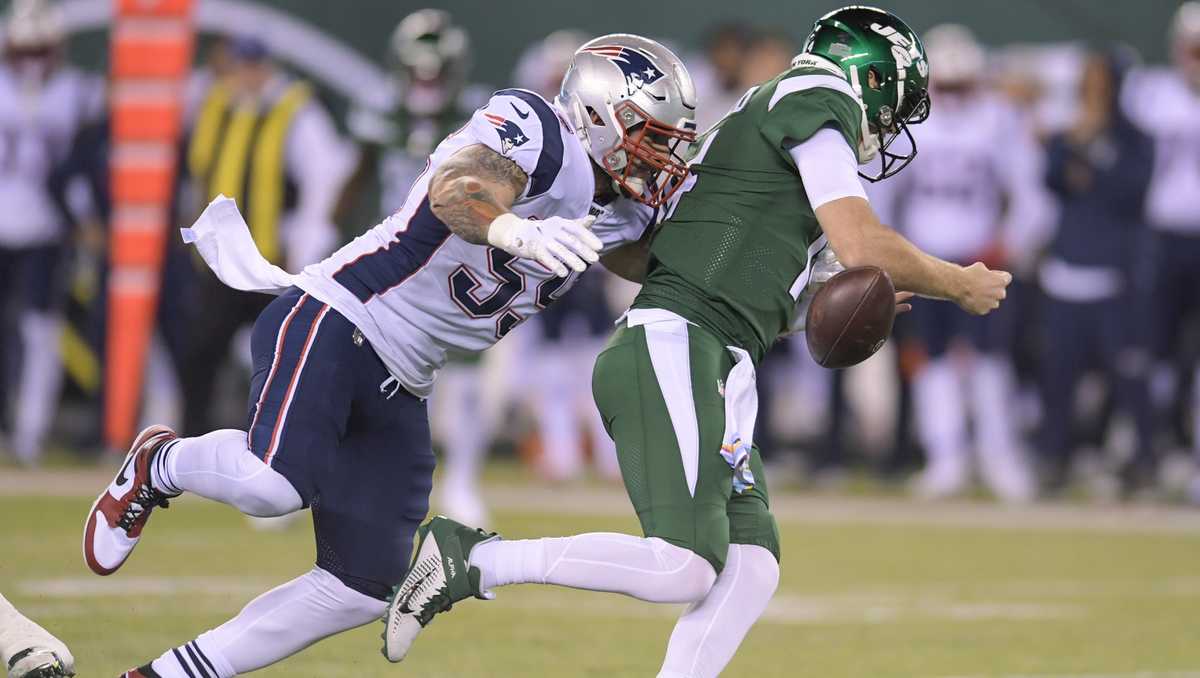 New England Patriots defensive end John Simon (55) during the