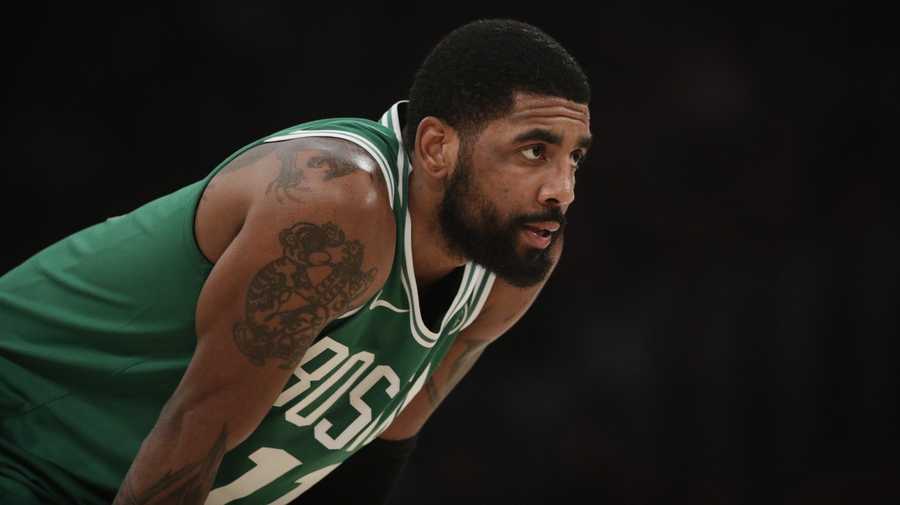 Boston Celtics' Kyrie Irving pauses during the first half of an NBA basketball game against the Los Angeles Lakers, Saturday, March 9, 2019, in Los Angeles. (AP Photo/Jae C. Hong)