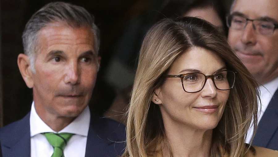 file   in this april 3, 2019, file photo, actress lori loughlin, front, and her husband, clothing designer mossimo giannulli, left, depart federal court in boston after a hearing in a nationwide college admissions bribery scandal a federal judge on friday, may 8, 2020, refused to dismiss charges against the couple and other prominent parents accused of cheating in the college admissions process, siding with prosecutors who denied that investigators had fabricated evidence ap photosteven senne, file