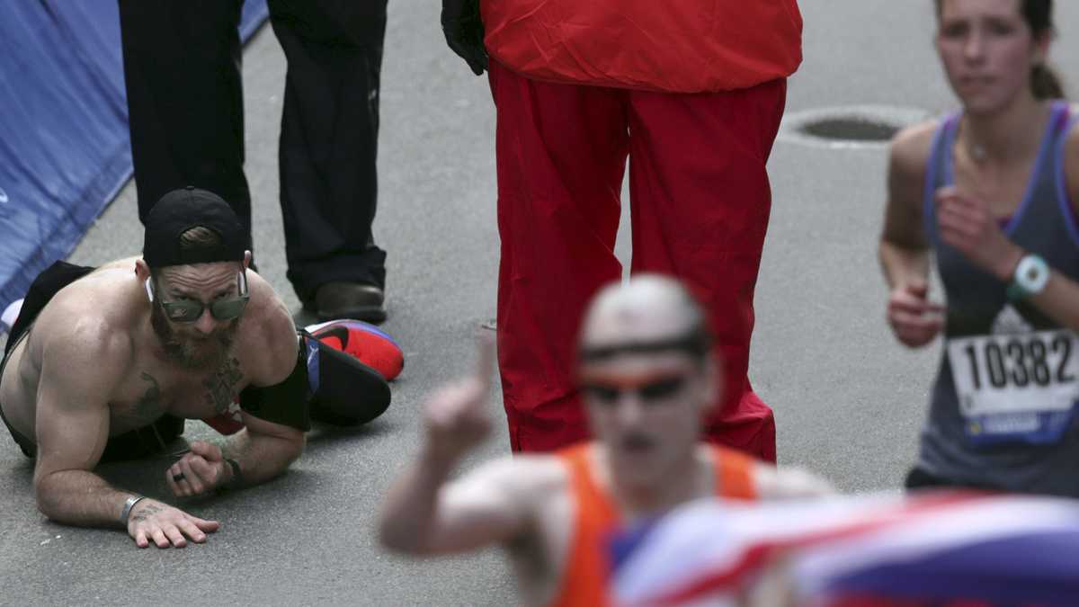 Boston Strong Man crawls across finish line of Boston Marathon