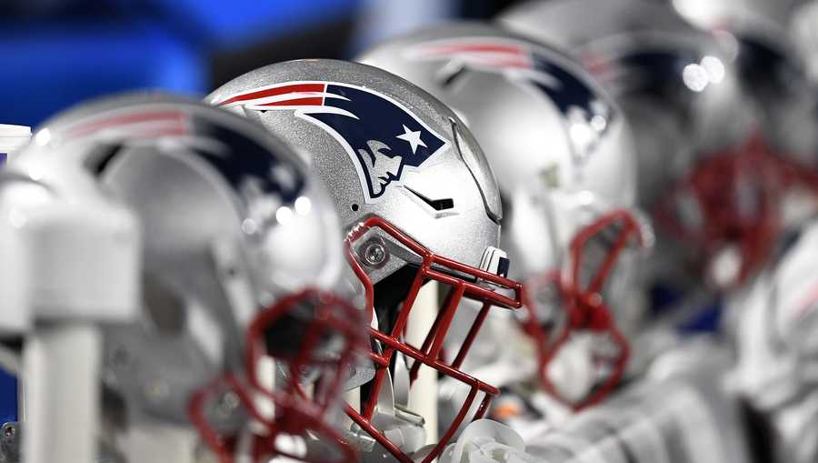 New England Patriots helmets sit on heaters along the bench during the second half of an NFL football game between the Buffalo Bills and the New England Patriots, Monday, Oct. 29, 2018, in Orchard Park, N.Y. The Patriots won 25-6. (AP Photo/Adrian Kraus)