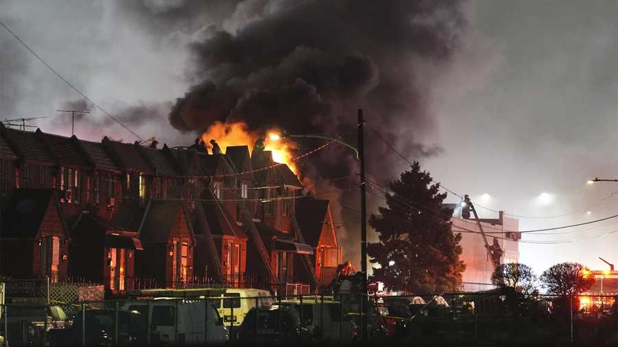 First responders work the scene after a small plane crashed in Philadelphia, Friday, Jan. 31, 2025,