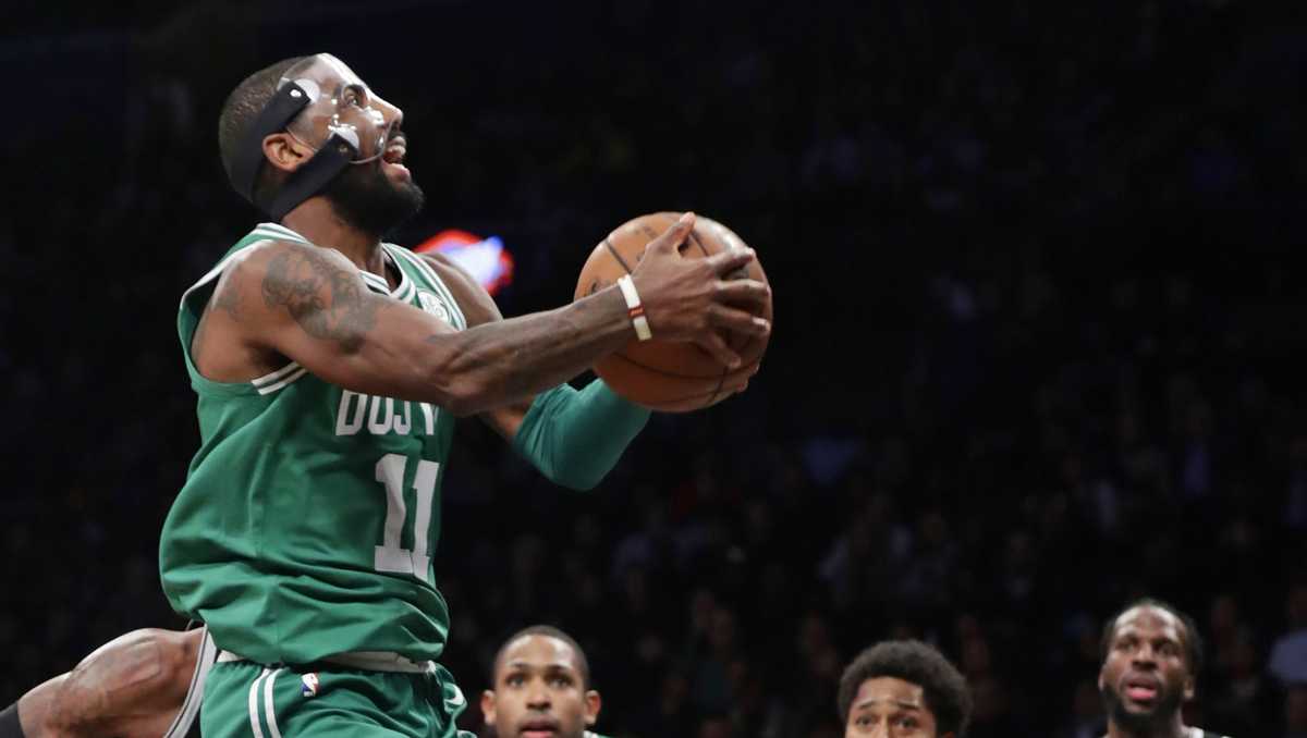Masked man: Kyrie returns as win 13th straight