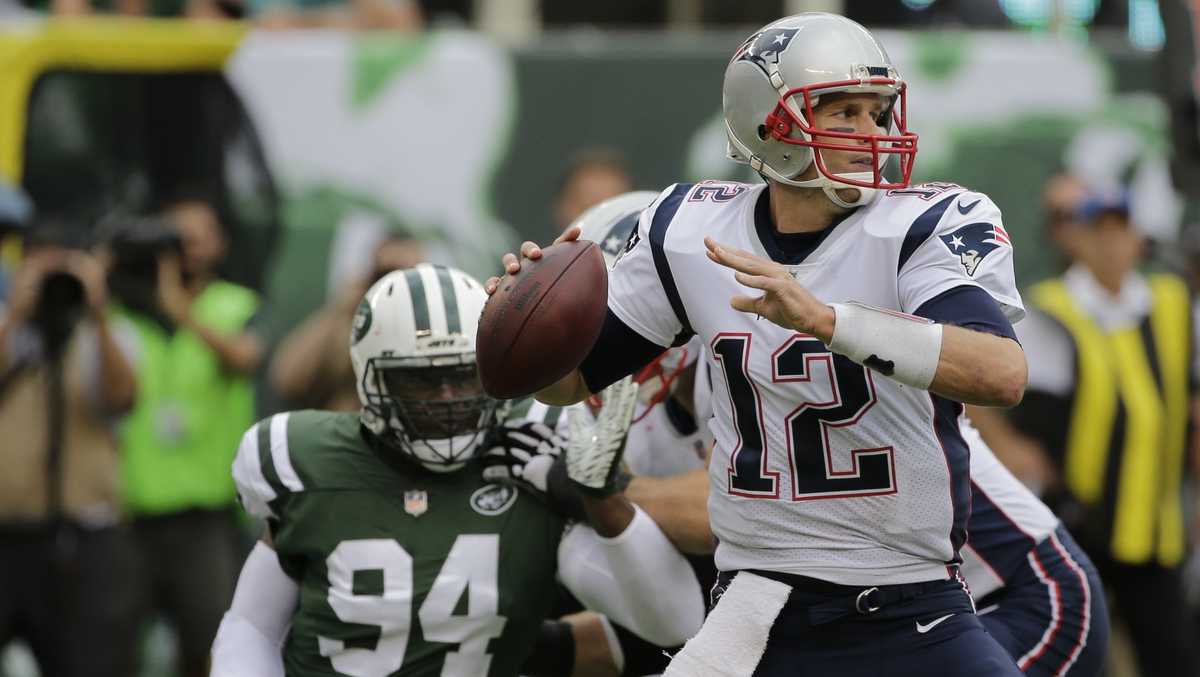 Tom Brady sets NFL wins record, as Patriots beat Jets