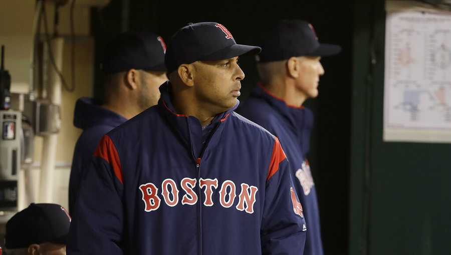 Boston Red Sox manager Alex Cora watches from the dugout during the fifth inning of a baseball game against the Oakland Athletics in Oakland, Calif., Monday, April 1, 2019. (AP Photo/Jeff Chiu)