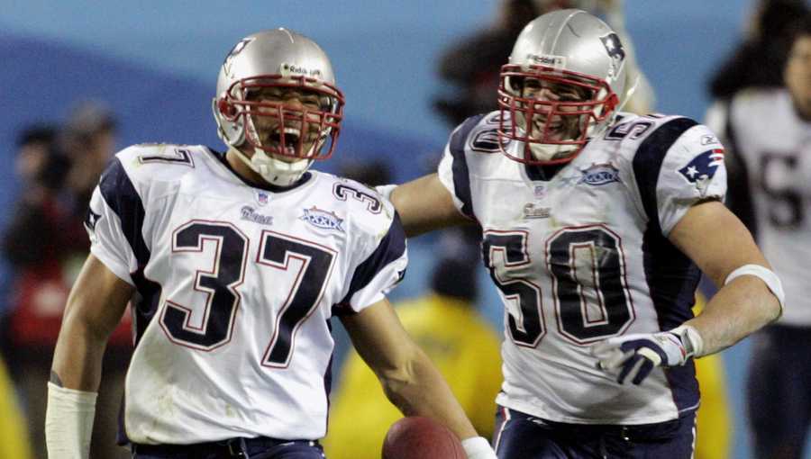 This is a Feb. 6, 2005 file photo showing New England Patriots' Rodney Harrison (37) celebrating an interception with teammate linebacker Mike Vrabel (50) late in the fourth quarter of the Patriots 24-21 victory over the Philadelphia Eagles during Super Bowl XXXIX at Alltel Stadium in Jacksonville, Fla. Harrison announced his retirement on Wednesday, June 3, 2009, saying he is through hitting quarterbacks after a 15-year career for the New England Patriots and San Diego Chargers. (AP Photo/Ann Heisenfelt, File)