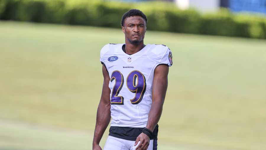 Baltimore Ravens cornerback Shaun Wade walks to a joint practice with the Carolina Panthers hosted by Carolina at the NFL football team&apos;s training camp in Spartanburg, S.C., Thursday, Aug. 19, 2021. (AP Photo/Nell Redmond)