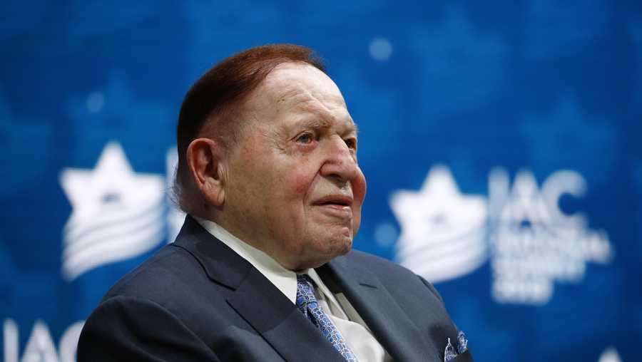 FILE - In this Dec. 7, 2019, file photo, Las Vegas Sands Corporation Chief Executive Sheldon Adelson sits onstage before President Donald Trump speaks at the Israeli American Council National Summit in Hollywood, Fla. Adelson and his wife have given $75 million to a new super PAC that is attacking Democratic nominee Joe Biden, an investment made amid GOP concern that President Donald Trump&apos;s campaign is flailing and might not be able to correct course. (AP Photo/Patrick Semansky, File)