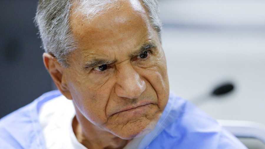FILE - In this Wednesday, Feb. 10, 2016, file photo, Sirhan Sirhan reacts during a parole hearing at the Richard J. Donovan Correctional Facility in San Diego. Sirhan, Sen. Robert F. Kennedy’s assassin, is hospitalized in stable condition after being stabbed by a fellow inmate at a Southern California prison, Friday, Aug. 30, 2019. (AP Photo/Gregory Bull, Pool, File)
