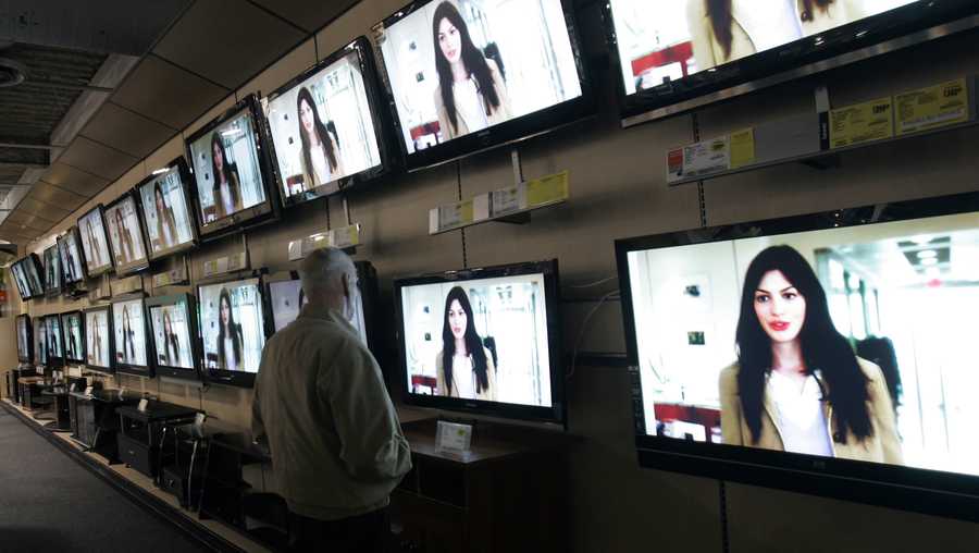File Photo: TV shopping in an electronics store