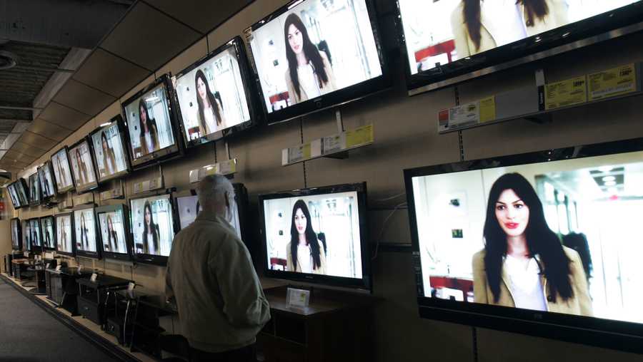 File Photo: TV shopping in an electronics store