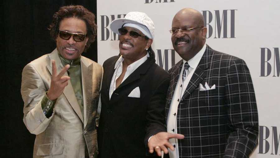 FILE - Members of The GAP Band, brothers Robert Wilson, from left, Charlie Wilson and Ronnie Wilson pose for photographers appear at the 2005 BMI Urban Music Awards in Miami Beach, Fla., on Aug. 26, 2005. Ronnie Wilson, multi-instrumentalist and founder of the funk group, has died. He was 73. His wife posted on Facebook that her husband died on Tuesday, Nov. 2, 2021. (AP Photo/Wilfredo Lee, File)