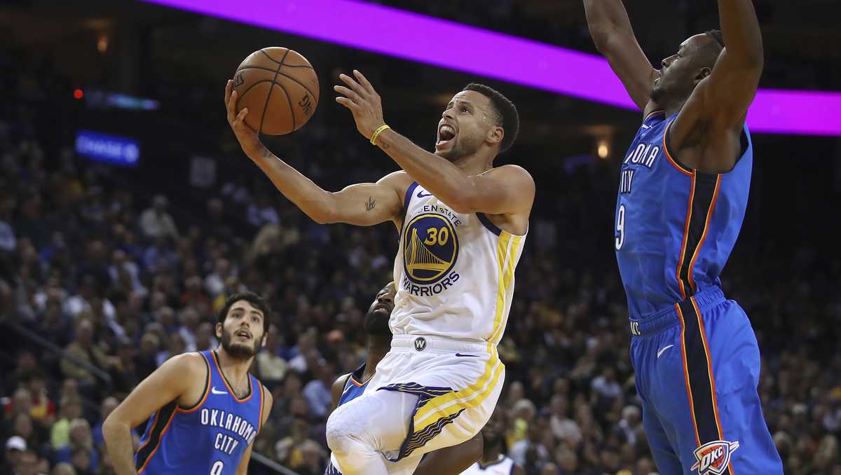 Curry, Durant Lead Warriors Past Thunder In Festive Opener