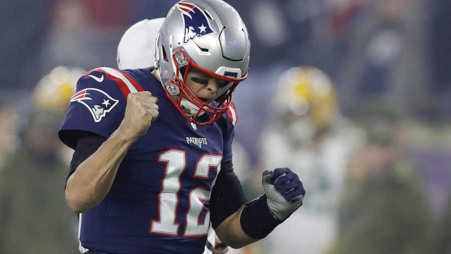 New England Patriots quarterback Tom Brady celebrates a touchdown run by James White during the first half of an NFL football game against the Green Bay Packers, Sunday, Nov. 4, 2018, in Foxborough, Mass. (AP Photo/Charles Krupa)