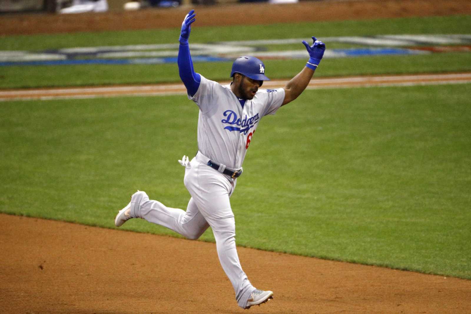 Los Angeles Dodgers' Yasiel Puig (66) celebrates with his teammates after  hitting a three-run home run during the sixth inning in Game 4 of the World  Series baseball game against the Boston