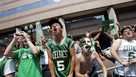 Boston Celtics fans cheer the team as they pass by during a parade through downtown Boston, Thursday, June 19, 2008. The team rode in a convoy of amphibious vehicles as part of a rolling rally to celebrate the team's first NBA Championship in 22 years. (AP Photo/Elise Amendola)