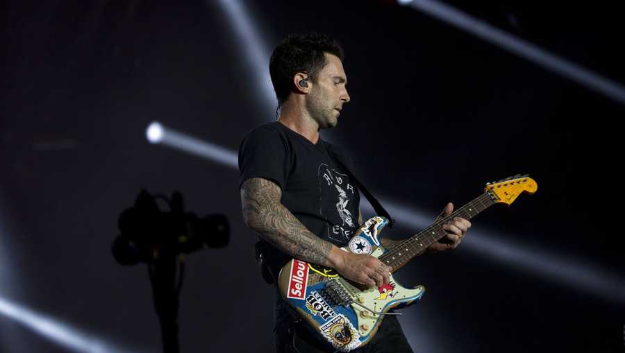 Adam Levine of Maroon 5 performs at the Rock in Rio music festival in Rio de Janeiro, Brazil, Saturday, Sept. 16, 2017. (AP Photo/Silvia Izquierdo)