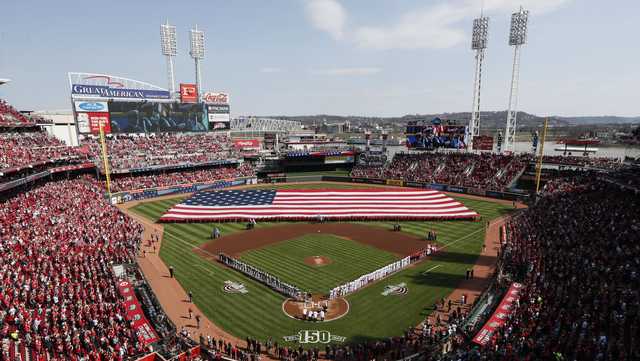 A giant American flag is unfurled on the field of Citizens Bank