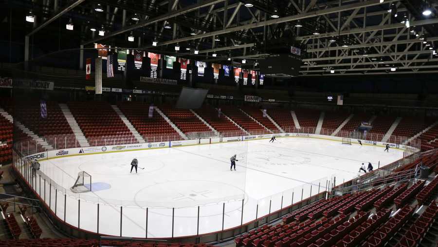 In this Dec. 4, 2014, file photo, hockey players skate at the Herb Brooks Arena, the site of the "Miracle on Ice," inside the Olympic Center in Lake Placid, N.Y. A scoreboard that marked the U.S. men&apos;s ice hockey team&apos;s victory against the Soviet Union at the 1980 Winter Olympics has found a new home in Colorado Springs. The Gazette reported Wednesday, April 17, 2019, that the panel that kept score of the game that became known as the "Miracle on Ice" will be permanently displayed in the U.S. Olympic Museum and Hall of Fame, which is expected to open next year. (AP Photo/Mike Groll, File)