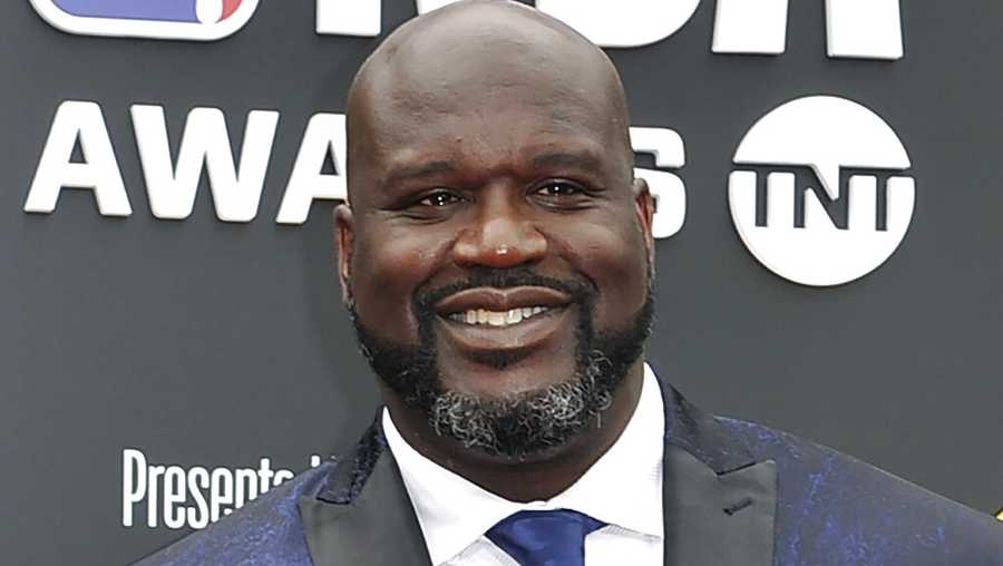 FILE - This June 24, 2019, file photo shows Shaquille O&apos;Neal at the NBA Awards in Santa Monica, Calif. A woman whose car was left stranded along a Florida interstate when her tire blew out got a little unexpected help from former NBA star Shaquille O&apos;Neal, sheriff&apos;s officials say. O&apos;Neal, who lives in the Orlando area, was traveling on Interstate 75 near Gainesville on Monday, July 13, 2020, when he saw the woman pull onto the side of the road, the Alachua County Sheriff’s Office said on a Facebook post. He stayed with the woman until deputies arrived at the scene. “He fist-bumped Deputies Purington and Dillon before going on his way,” the sheriff’s office wrote on Facebook.  (Photo by Richard Shotwell/Invision/AP, File)