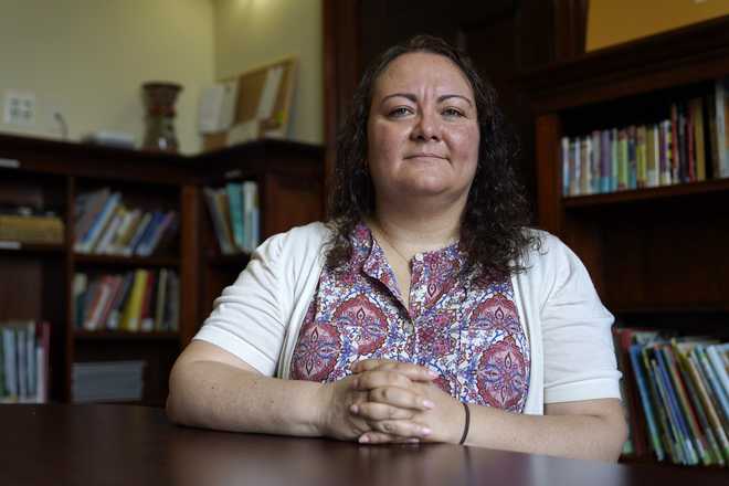 Dr.&#x20;Michelle&#x20;LaRue&#x20;sits&#x20;for&#x20;a&#x20;portrait&#x20;in&#x20;Hyattsville,&#x20;Md.,&#x20;on&#x20;Wednesday,&#x20;Aug.&#x20;12,&#x20;2019.