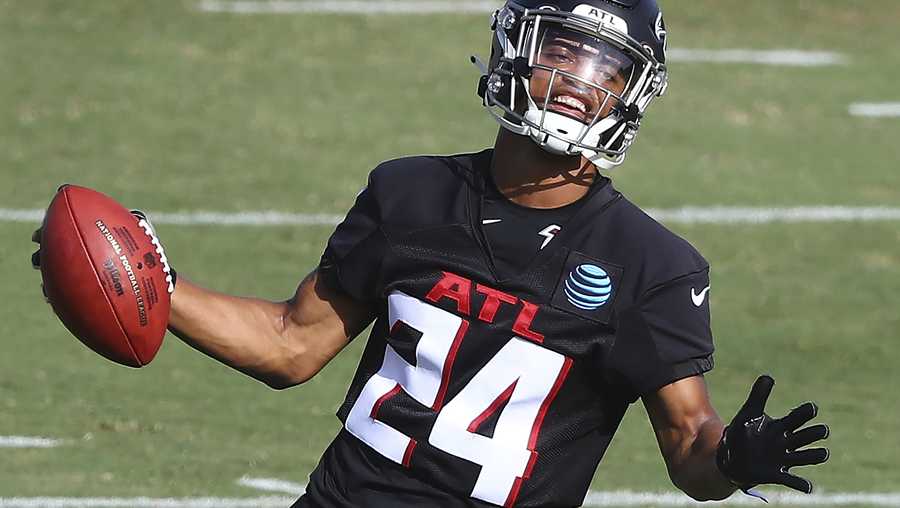 Atlanta Falcons cornerback A.J. Terrell reacts while running a defensive drill during an NFL football training camp practice in Flowery Branch, Ga., Thursday, Aug. 27, 2020.