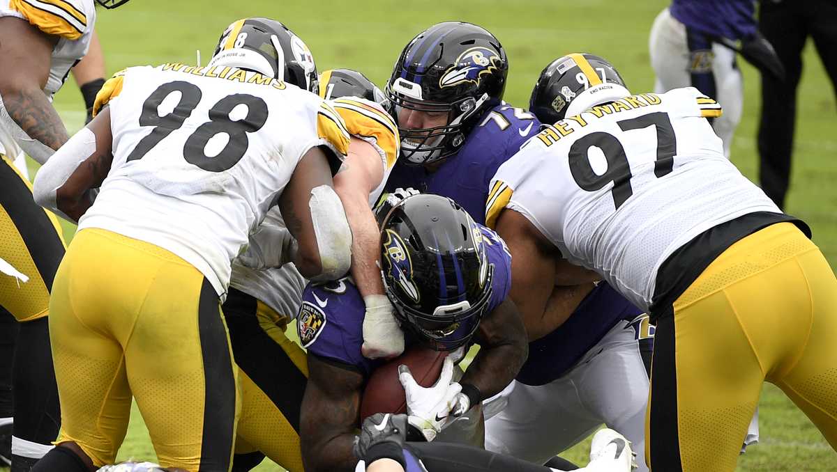 Pittsburgh Steelers' Chase Claypool runs against the Baltimore